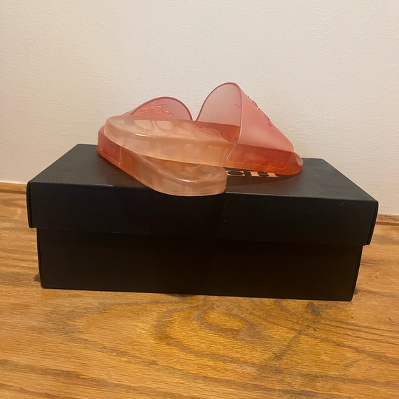 Pair of Coach Pink slides never worn. They are a size 6. Perfect gift idea. - Picture 3 of 4